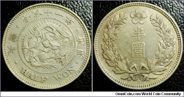Korea 1907 half won. High grade but old cleaning. Weight: 10.02g