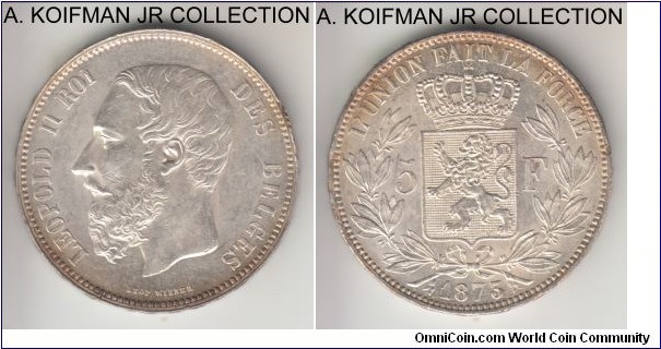 KM-24, 1873 Belgium 5 francs; silver, lettered raised edge; Leopold II, position A variety with longer PROTEGE and stars on one peak, nice almost uncirculated with pleasant toning, small edge impact.