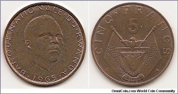 5 Francs
KM#6
Bronze Obv: Head 3/4 right Rev: Value above flag draped arms