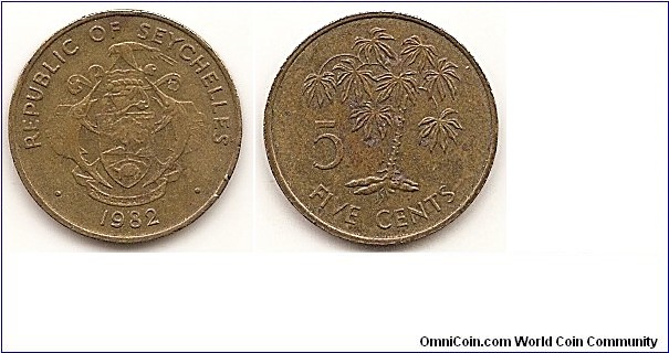 5 Cents
KM#47.1
1.9500 g., Brass, 18 mm. Obv: Arms with supporters Rev: Value at lower left of tapioca plant