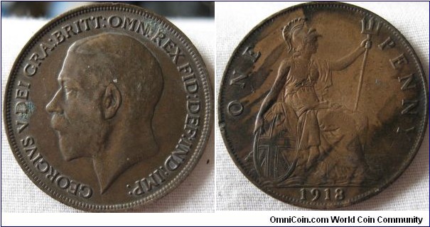 1918 penny, high grade, however weak striking and strange discolouration.