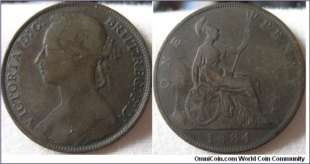 1884 penny, near fine grade, bit dark though