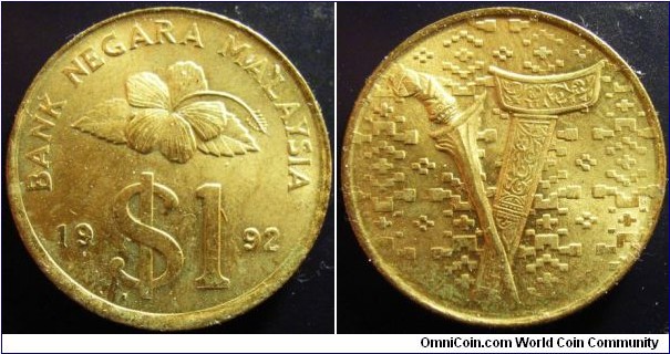 Malaysia 1992 1 ringgit. Some unfortunate verdigris is forming otherwise is a nice coin. 