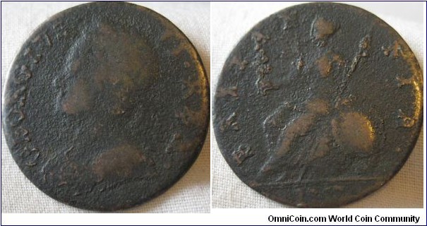 1753 halfpenny, pitted and worn