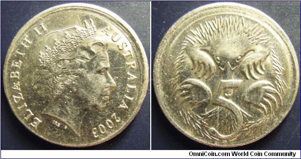 Australia 2003 5 cents, slightly off center. Found it circulating. 