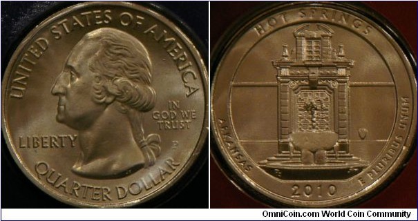 Hot Springs Arkansas. First of the America the Beautiful Quarters™ Program.  Image depicts the façade of the Hot Springs National Park headquarters building with a thermal fountain in the foreground. Established 4-20-1832 (ref. http://www.usmint.gov/mint_programs/atb/?local=HotSprings)