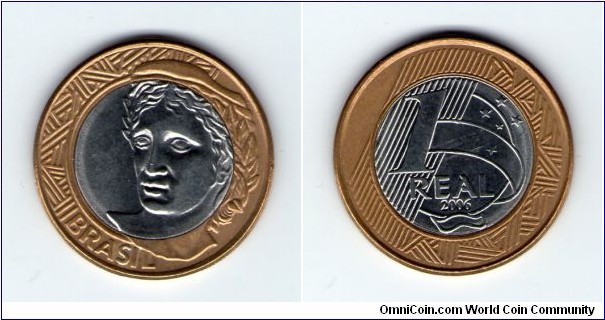 1 Real Copper-Nickel center in Brass ring.