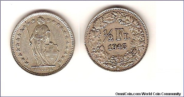One half franc.  (Note not tariffed as 50 rappen.  This silver coin was subsidiary coinage, not a minor coin.