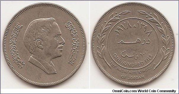 100 Fils -AH1398-
KM#40
12.0000 g., Copper-Nickel, 30 mm.   Ruler: Hussein Ibn Talal Obv: Head right Rev: Value and date within circle flanked by sprigs Edge: Milled