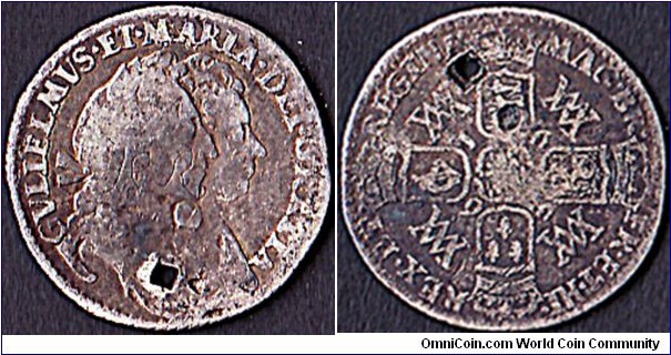 England 1693 6 Pence.

The silver coins from 6 Pence upwards are very scarce.