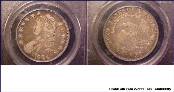 A nice, relatively common O-104 (R-2) die marriage in VF, but with beautiful toning in a pattern I love, rich gold an auburn in the center with a ring of electric blue around the periphery (not that you can tell that from my poor photos).