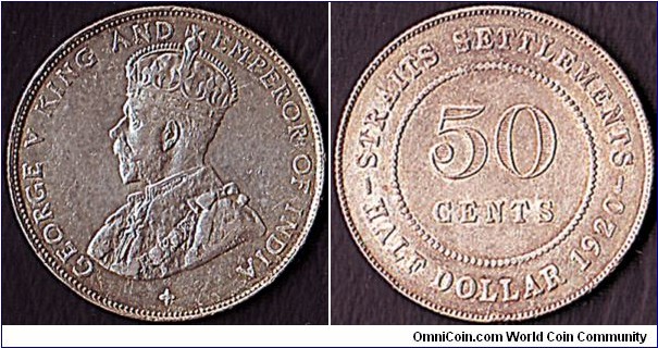 Straits Settlements 1920 50 Cents (1/2 Dollar).

Cross under head.