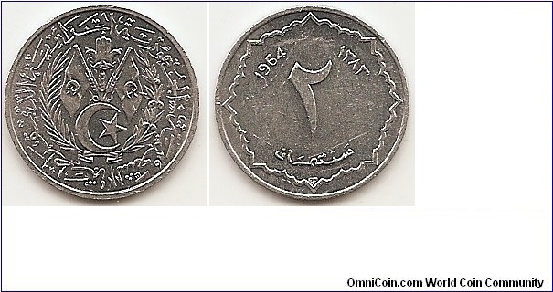 2 Centimes -AH1383-
KM#95
0.6000 g., Aluminum, 18.3 mm.   Obv: Arms within wreath Rev: Value at center of scalloped circle Edge: Plain