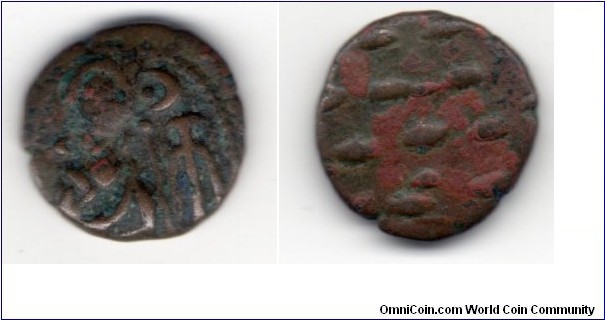 Elymais
Phraates 
c AD 150? 
AE Drachm
2.63g, 15mm - SGI 5902
Bust left-anchor-crescent & star 
Reverse of dashes