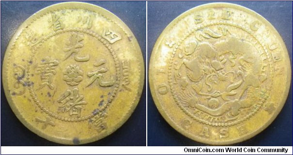 China Szechuan 1902-1905(?) 10 cash. Struck in brass, reduced copper content. Die rotation error. 