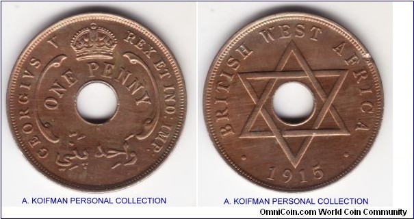 KM-9, 1915 British West Africa penny, Heaton mint (H mintmark); copper-nickel, plain edge; uncirculated, a small flan defect, nice golden tone which is a bit unusual for these coins.