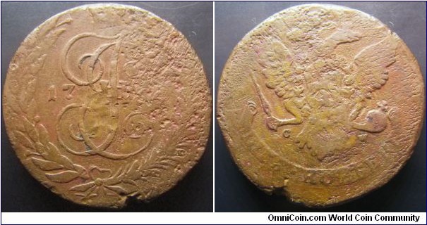 Russia 1764 CM 5 kopek. Low grade but tough coin to find. Weight: 49.2g. Seems to be overstruck...