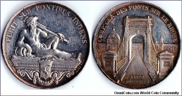 silver jeton issued for the Compagnie Generale des Ponts sur Le Rhone (Rhone Bridges). This one depicting the river god of the Rhone (obverse) and the bridge at Lyon (reverse)