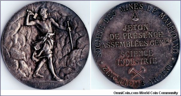 scarce silver jeton de presence minted in Paris for the Societe des Mines de Malfidano a french company established to develop  /exploit the use of zinc. Malfidano however is in Sardinia and events at the mine there had significance throughout Italy and France in the early 1900's.