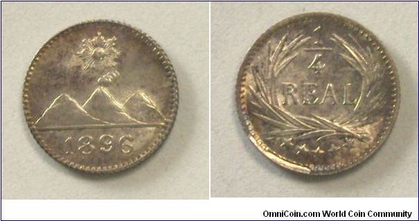 Rare Uncirculated Die Break Cud 1896 Guatemala 1/4 Real. One of only several known which all in my collection. I have 2 others left besides two which were stolen in the heist. 

If anyone attempts to sell you one these coins please contact me at the email address provided. REWARD!