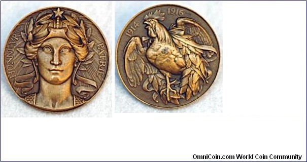 Honneue Patrie Medal. Bronze 50MM
Obv: A facing female head wearing a helmet & wreath. Rev: A rooster. Engraved by Auguste Dujardin.