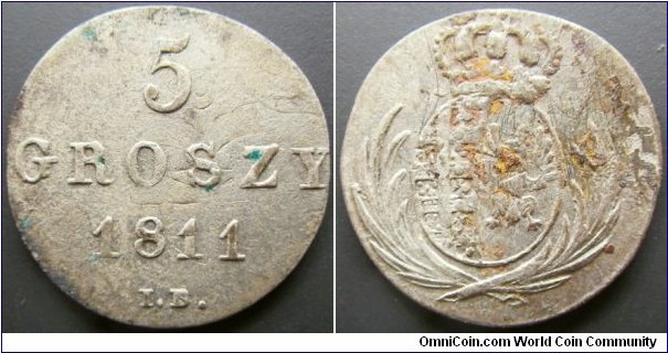 Poland 1811 5 groszy. Seems to be overstruck over a German coin. Can't quite tell what it is yet. Scratched. Weight: 1.85g