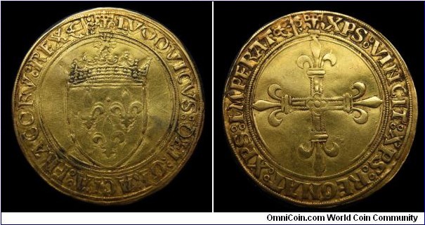 Louis XII French Ecu Au Soleil. 
Crowned shield sun above. Cross Fleury.
Mintmark anchor (Bayonne mint). 