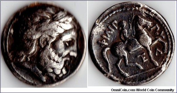 silver tetradrachm of Philip II of Macedon (Father of Alexander the Great). This coin struck circa 348 bc.
Obverse Zeus. Reverse naked boy rider on horseback. Lambda under foreleg and TE under horse belly.