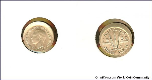 1950 Threepence. 2mm mis-strike.