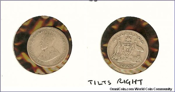 1928 Sixpence. Small holes of the 8 & the 8 tilts to the right