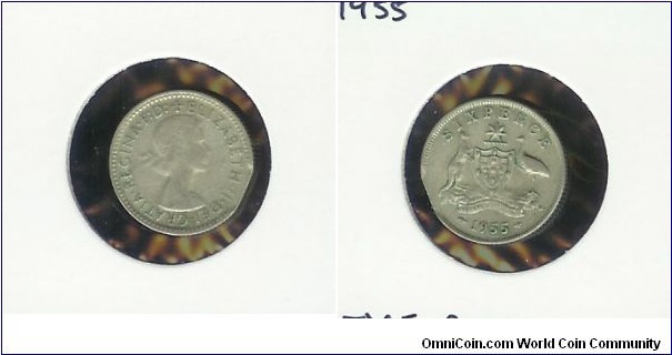 1955 Sixpence. Bitten edge