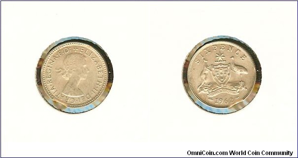 1962 Sixpence. Bitten edge