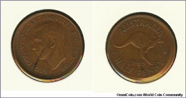 1945 Halfpenny. Mis-strike.