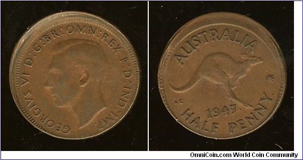 1947 Halfpenny. 2mm mis-strike