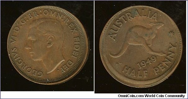 1949 Halfpenny. 1mm mis-strike with obverse lip