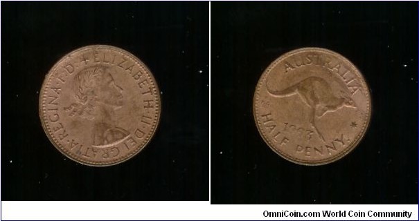 1963 Halfpenny. Weak struck date. '93' very faint.