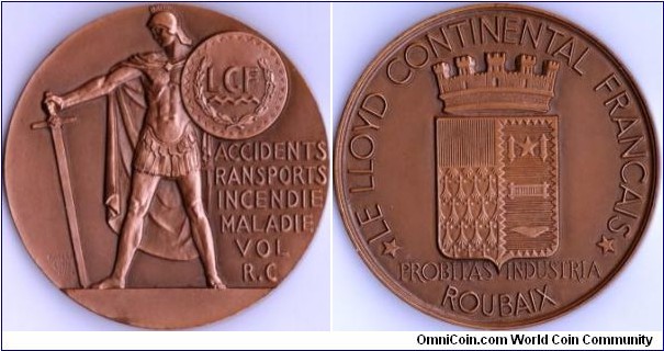 another very large 3 dimensional lump of bronze in the shape of a medal struck for Lloyd Continental Francais, a french based assurance company covering a wide variety of risks. I'm unsure as to the date of issue for this piece.