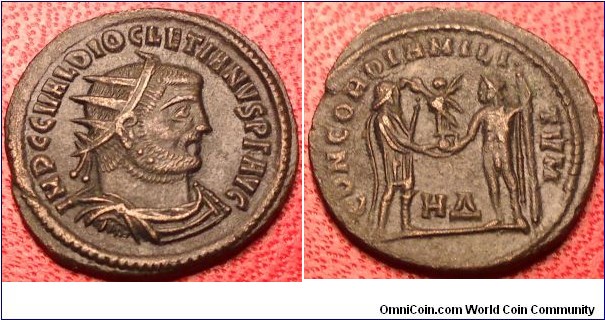 DIOCLETIAN
AE
	IMP C C VAL DIOCLETIANVS PF AVG
radiate, draped and cuirassed bust right 	CONCORDIA MILITVM
Jupiter presents Victory on a globe to Diocletian Mint:	HERRACLEA (AD 291)