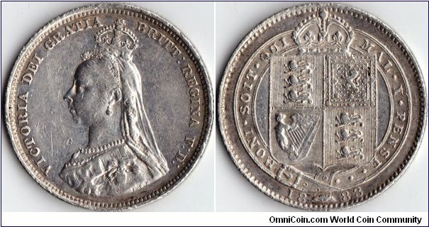 silver shilling with Queen Victoria sporting what must have been the most ill fitting crown ever made.