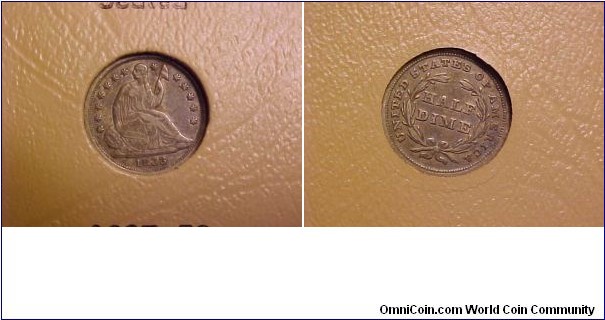 A nice early seated half dime, with stars, no drapery.
