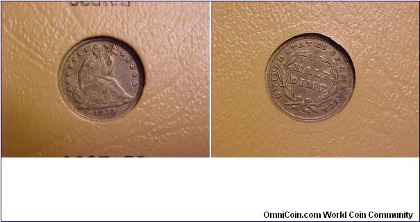 A nice early seated half dime, with stars, no drapery.
