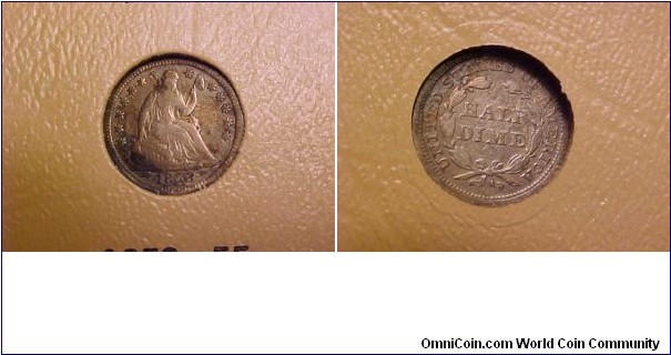 A with arrows half dime from the type set.  Arrows were used to denote the change in weight from 1.34g to 1.24g.