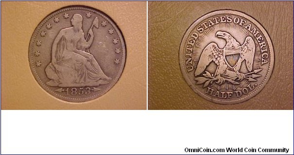 An 1853 seated Liberty half dollar with arrows and rays, again a beautiful reverse design!