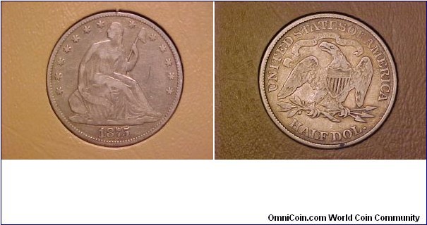 The last seated Liberty half dollar sub-type, with motto on the reverse.