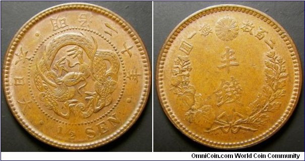 Japan 1887 half sen. Weakly struck but nice condition!!! Practically UNC. Weight: 3.64g. 