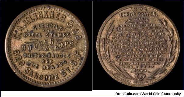 C.A. Klinkner store card and Lord's Prayer token, brass.