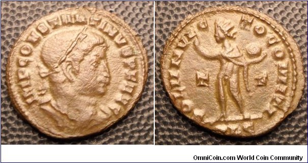 Constantine AE Follis. 317 AD. CONSTANTINVS P F AVG, laureate, cuirassed bust right / SOLI INVIC-TO COMITI, Sol standing left, chlamys over left shoulder, holding globe, right hand raised, T-F across fields. 